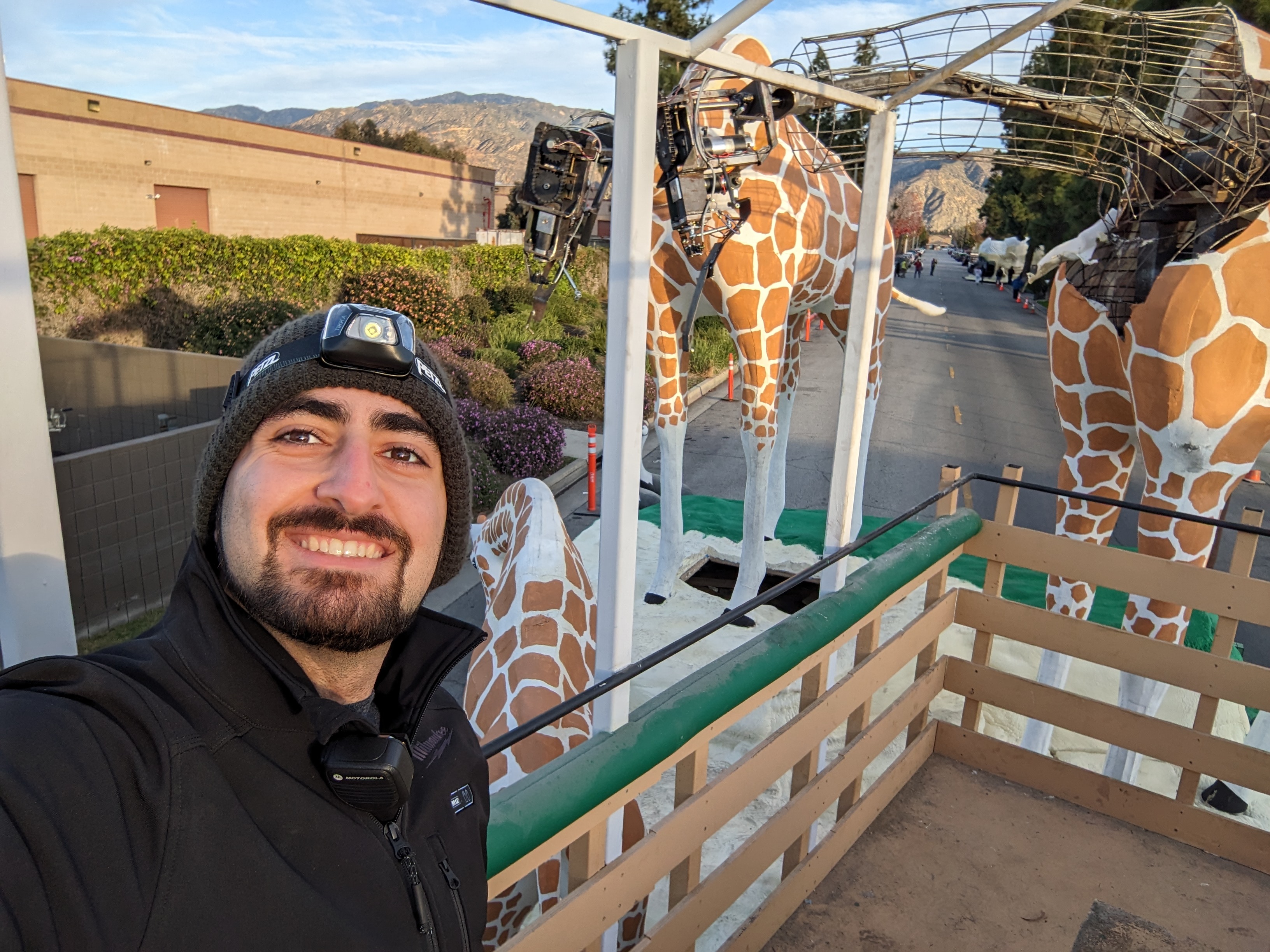 Me in the back of the safari truck taking a selfie with the giraffes